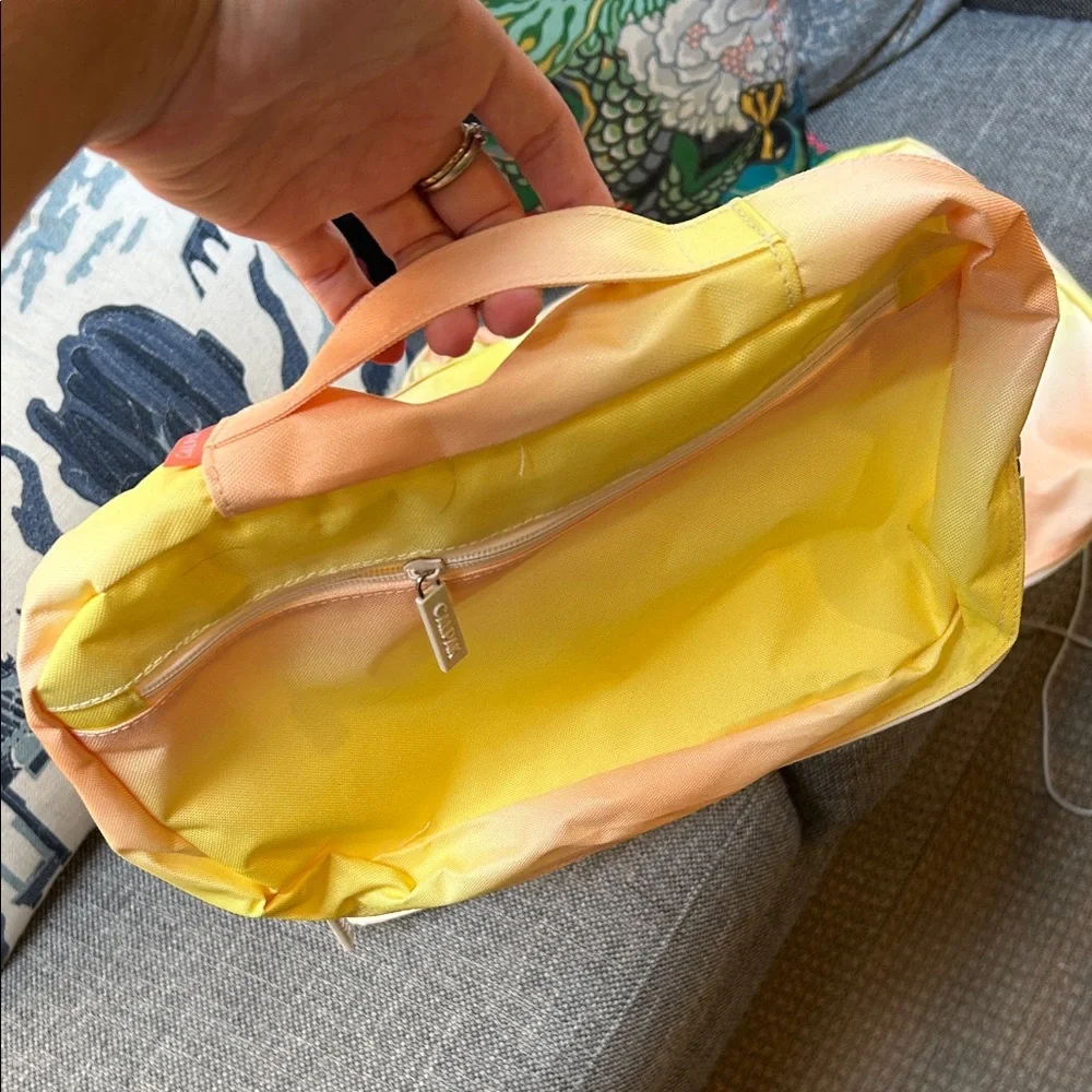Calpak Yellow and Cream Garment Bags